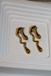 Xira Melted Studs